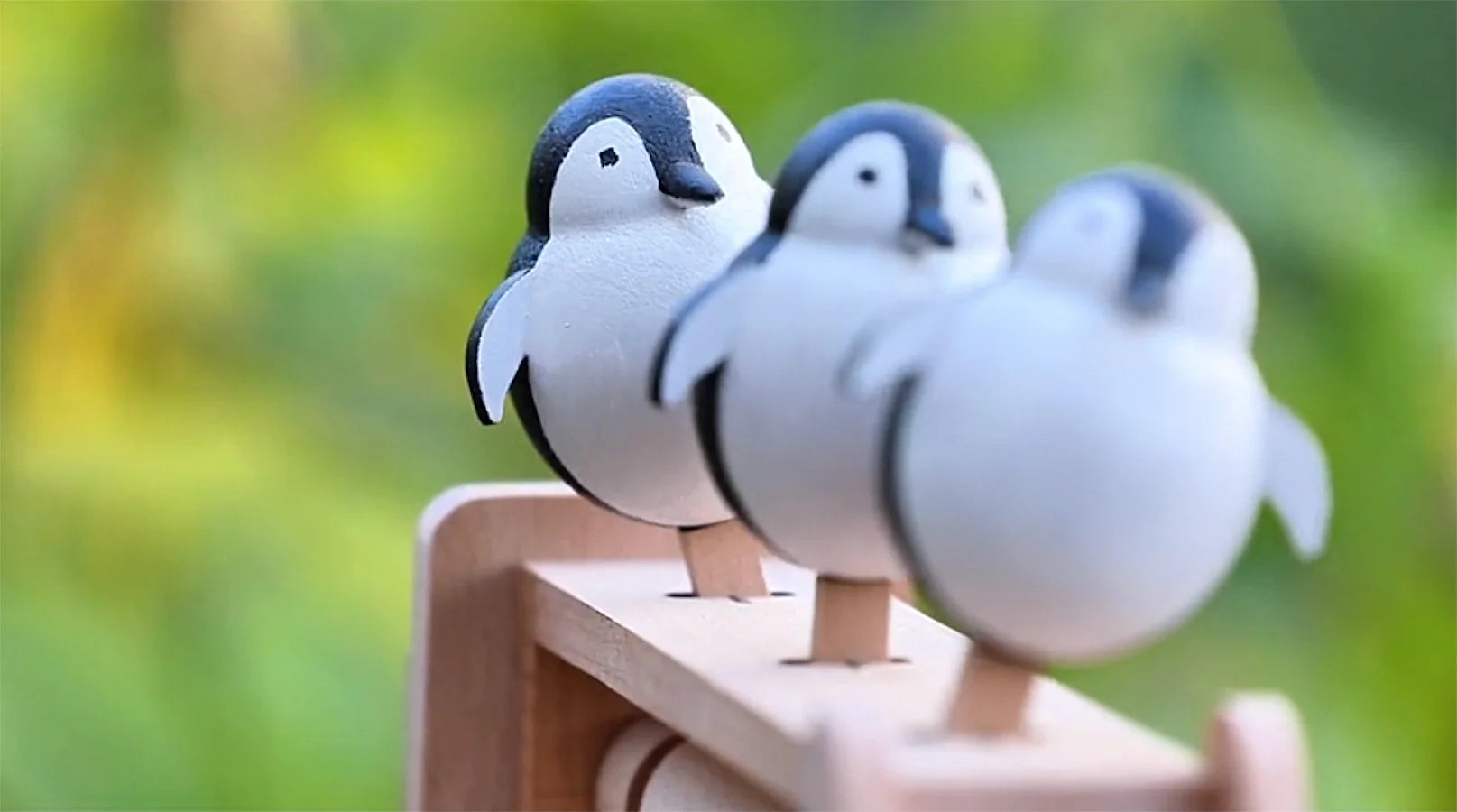 Handcrafted Electrically Swinging Wooden Penguin Toy - Mike Uncle