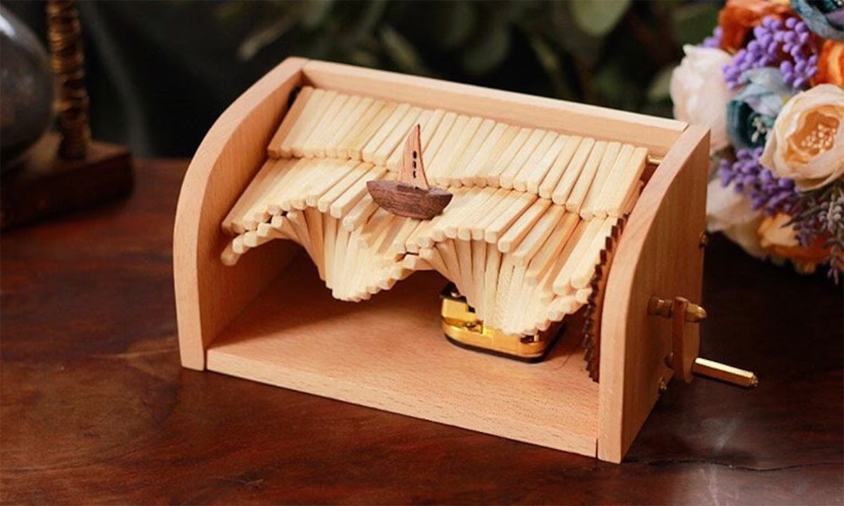 Handcrafted Music Box Shaped like a Boat Sailing through Waves - Mike Uncle
